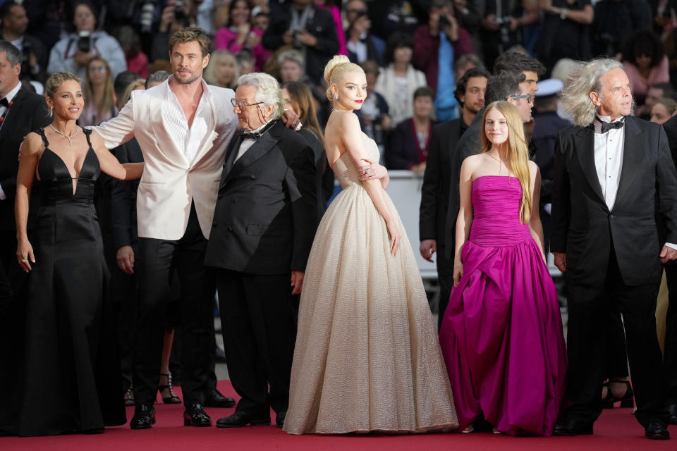 Elsa Pataky, from left, Chris Hemsworth, director George Miller, Anya Taylor-Joy, Alyla Browne, and producer Doug Mitchell pose for photographers upon arrival at the premiere of the film 'Furiosa: A Mad Max Saga' at the 77th international film festival, Cannes, southern France, Wednesday, May 15, 2024. (Photo by Andreea Alexandru/Invision/AP)