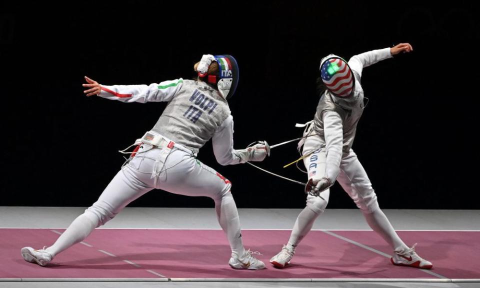 Lee Kiefer (right) competes against Italy’s Alice Volpiin the women’s team foil event.