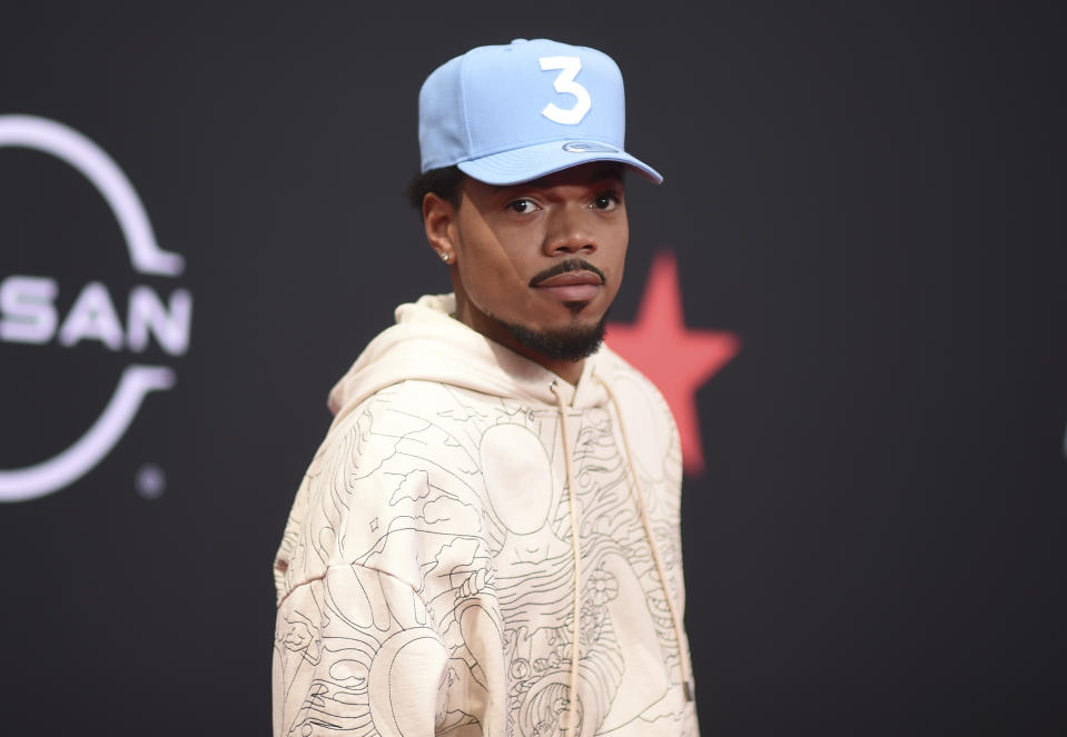FILE - Chance the Rapper arrives at the BET Awards on June 26, 2022, at the Microsoft Theater in Los Angeles. Iconic music producer Quincy Jones and entertainers Jennifer Hudson and Chance the Rapper are co-owners of the historic Ramova Theatre on Chicago's South Side. The Chicago Sun-Times reports that their ownership was announced Wednesday, Nov 15, 2023. The Ramova has been closed for nearly four decades and no opening date has been announced. (Photo by Richard Shotwell/Invision/AP, File)