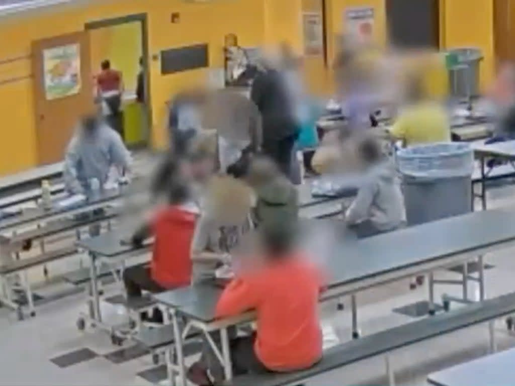 Surveillance video shows a lunch monitor forcing an elementary school child to eat from a trash can (WOIO)