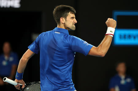 Tennis - Australian Open - Men's Singles Final - Melbourne Park, Melbourne, Australia, January 27, 2019. Serbia's Novak Djokovic reacts during the match against Spain's Rafael Nadal. REUTERS/Lucy Nicholson