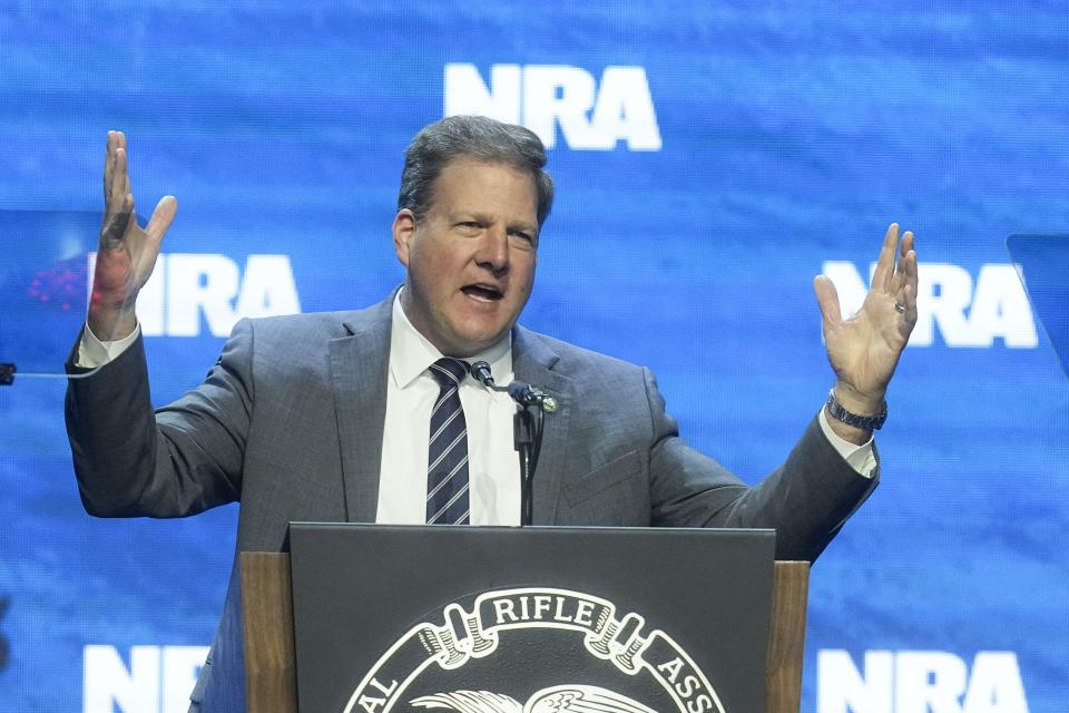 New Hampshire Gov. Chris Sununu speaks during at the National Rifle Association Convention, Friday, April 14, 2023, in Indianapolis. (AP Photo/Darron Cummings)