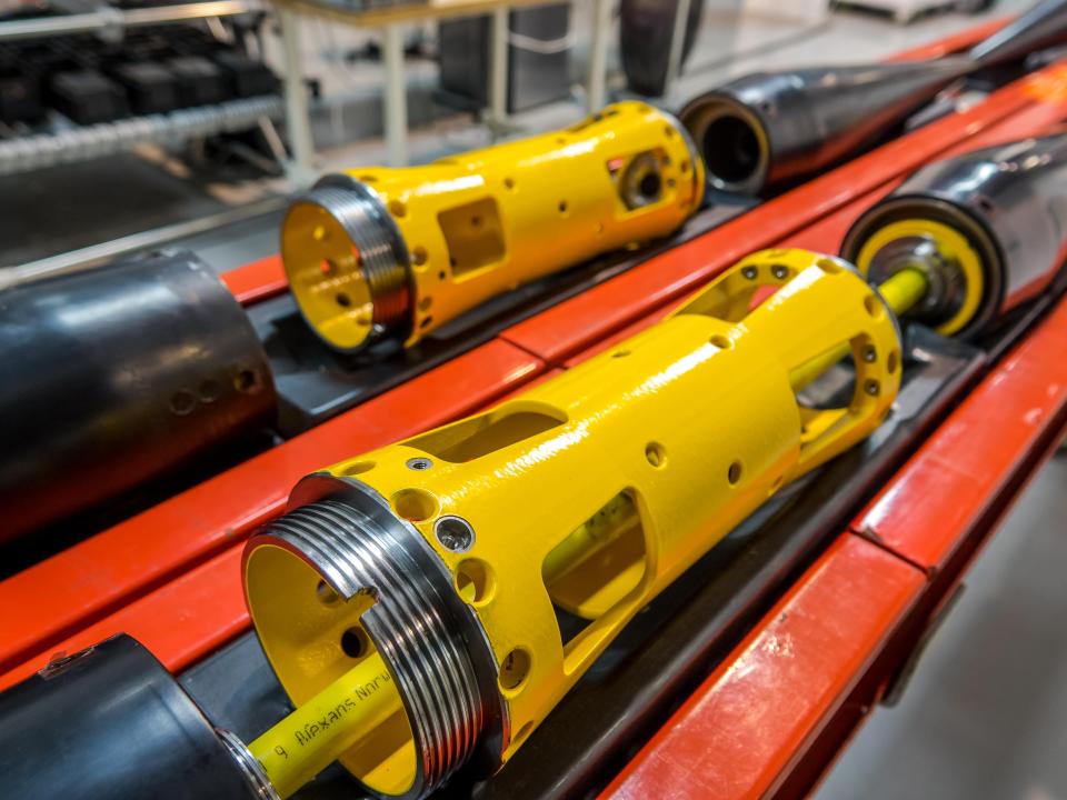 Subsea cables in the process of being manufactured.