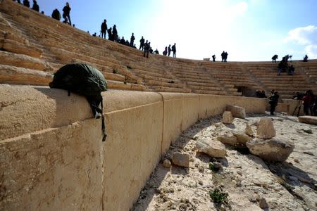 People gather in the amphitheater of the historic city of Palmyra, Syria March 4, 2017. REUTERS/Omar Sanadiki