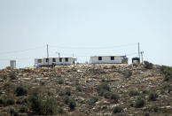 The the newly established Jewish outpost of Eviatar is seen from the Palestinian village of Beita, south of the West Bank city of Nablus, Monday, June 14, 2021. Israel’s new government faces an early test in deciding whether to evacuate dozens of Israeli families from Eviatar, that was established last month without the permission of Israeli authorities on land the Palestinians say is privately owned. (AP Photo/Majdi Mohammed)