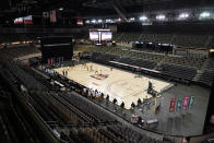 Oakland and Cleveland State play at Farmers Coliseum during the second half of an NCAA college basketball game in the men's Horizon League conference tournament championship game, Tuesday, March 9, 2021, in Indianapolis. The coliseum is one of six venues hosting NCAA Tournament games later this week.(AP Photo/Darron Cummings)