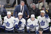 Toronto Maple Leafs head coach Sheldon Keefe, top center, calls to his players during the third period of Game 2 of an NHL hockey Stanley Cup first-round playoff series against the Boston Bruins, Monday, April 22, 2024, in Boston. (AP Photo/Charles Krupa)