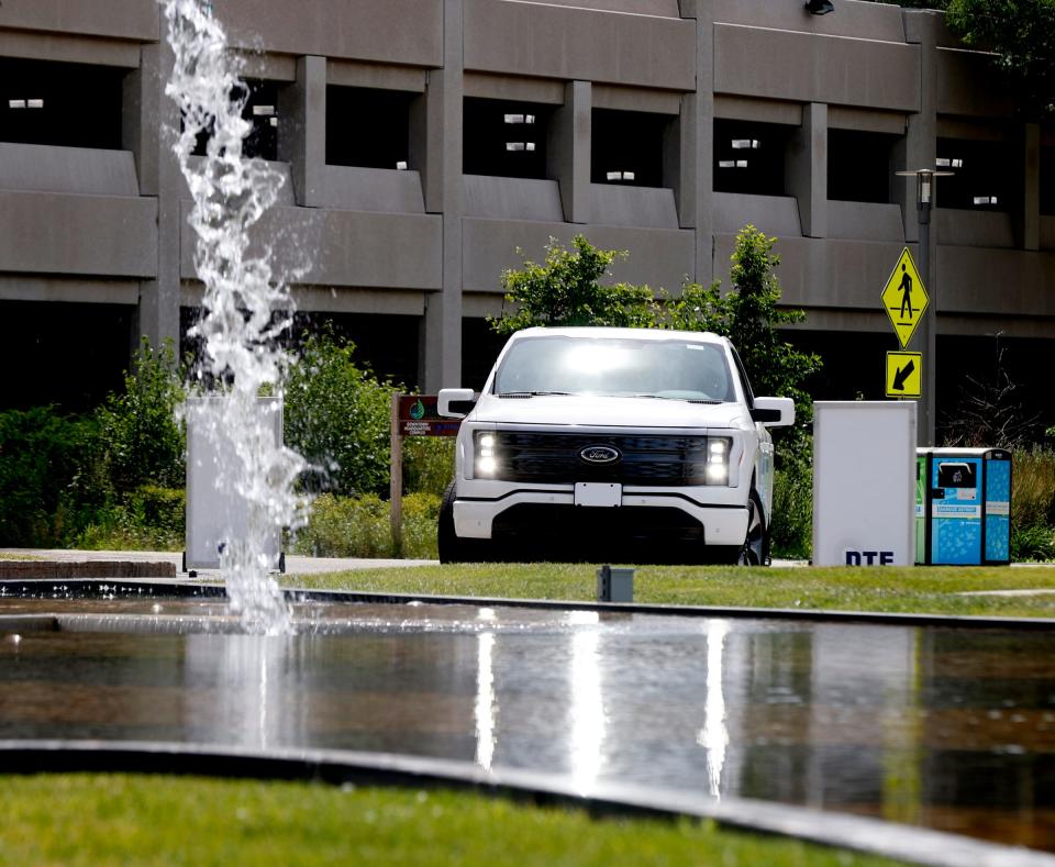 A Ford Lightning EV being driven by a participant pulls back into the DTE headquarters in Detroit on June 25, 2022, after a 2-mile loop during the ride and drive of various electric cars and pickup trucks.