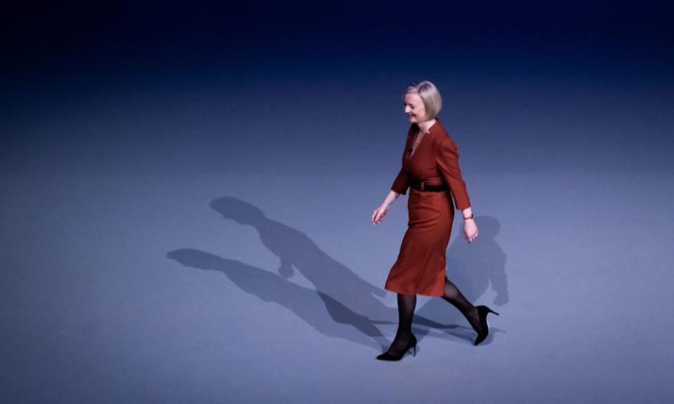 Liz Truss walks off stage after delivering her keynote speech at the Conservative party conference