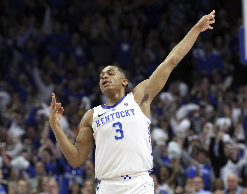 Kentucky's Keldon Johnson (3) celebrates a 3-point basket during the first half of an NCAA college basketball game against Tennessee in Lexington, Ky., Saturday, Feb. 16, 2019. (AP Photo/James Crisp)