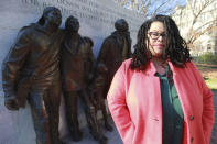 Wake Forest alumni Palinda Carrington poses in front of the Virginia Civil Rights Monument on Capitol Square in Richmond, Va., Sunday, Dec. 15, 2019. The school struggled with racial issues in the last school year and how it's addressed them will be a topic for the new school year. (AP Photo/Steve Helber)