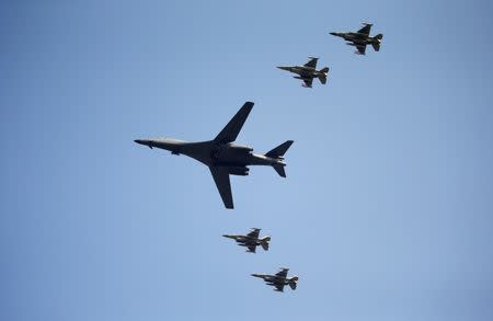 A U.S. Air Force B-1B bomber flies over Osan Air Base in Pyeongtaek, South Korea, September 13, 2016. REUTERS/Kim Hong-Ji