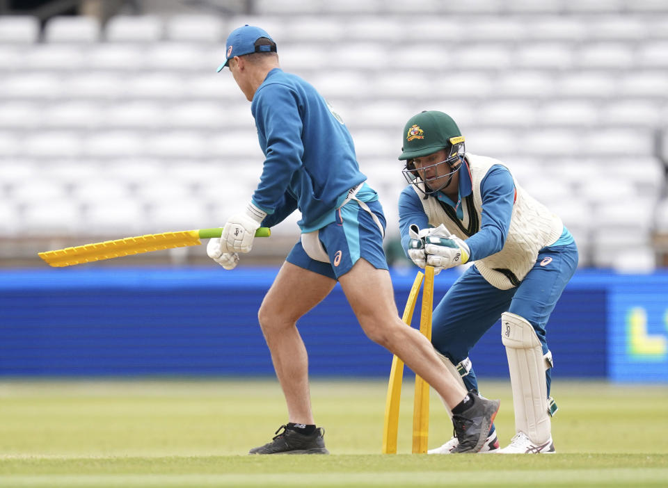 Australia's Alex Carey, right, during a nets session at Headingley, Leeds, England, Wednesday, July 5, 2023. (Martin Rickett/PA via AP)