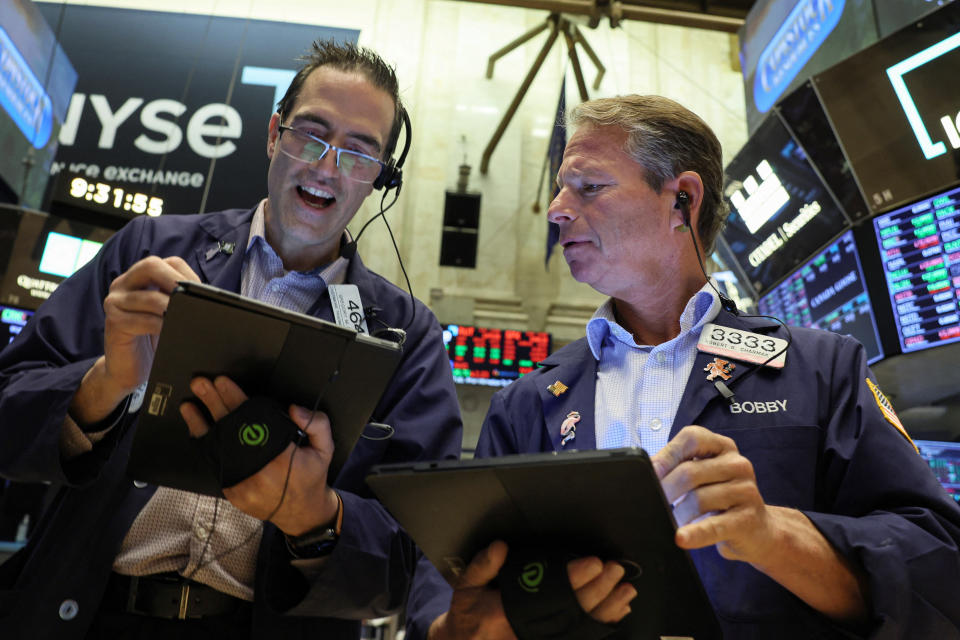 Traders work on the floor of the New York Stock Exchange (NYSE) in New York City, U.S., September 26, 2022. REUTERS/Brendan McDermid