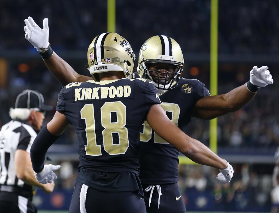 ARLINGTON, TEXAS - NOVEMBER 29: Keith Kirkwood #18 of the New Orleans Saints celebrates a third quarter touchdown with Benjamin Watson #82 against the Dallas Cowboys at AT&T Stadium on November 29, 2018 in Arlington, Texas. (Photo by Richard Rodriguez/Getty Images)