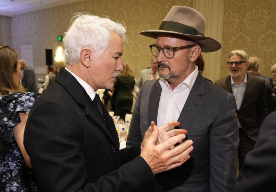 Directors Baz Luhrmann, left, and Todd Field mingle at the 2023 AFI Awards, Friday, Jan. 13, 2023, at the Four Seasons Beverly Hills in Los Angeles. (AP Photo/Chris Pizzello)