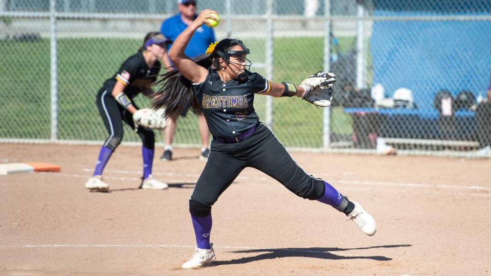Orestimba’s Jacquelyn Lujan delivers a pitch during a Southern Athletic League game with Ripon Christian at Ripon Christian High School in Ripon, Calif., Thursday, April 20, 2023.