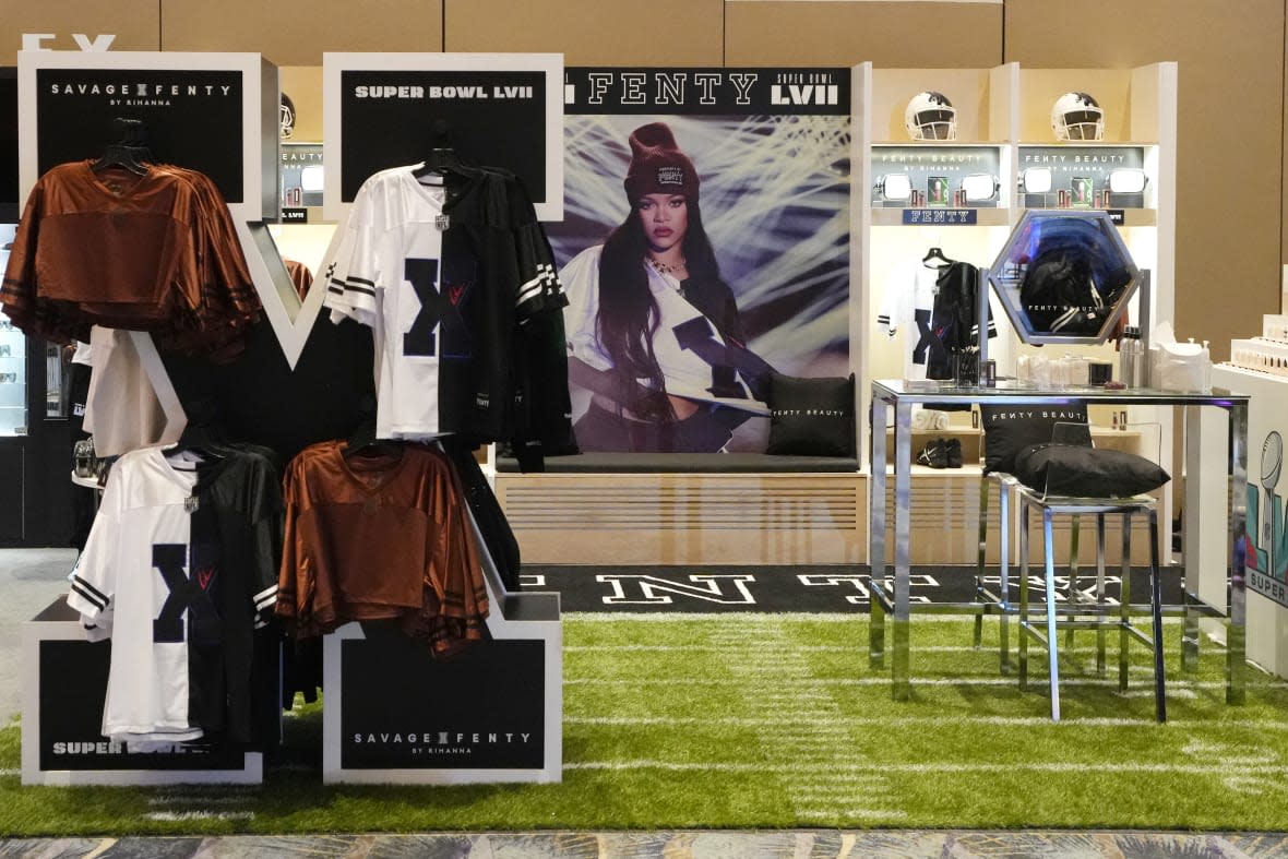 The new Rihanna Fenty collection is displayed at the NFL Shop at the Super Bowl Experience, the event venue leading up to the NFL Super Bowl LVII football game in Phoenix, Friday, Feb. 3, 2023. (AP Photo/Ross D. Franklin)