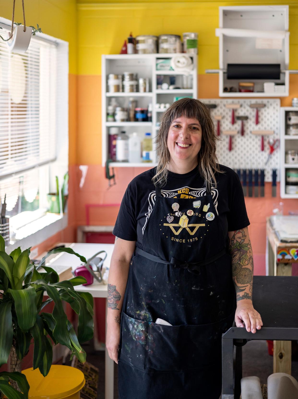 Amanda Burk, owner of Flat File Print Shop, poses for a portrait at her studio on Friday, July 29, 2022 in Athens. Burk has been in the printmaking business for 20 years and opened Flat File Print Shop this past June.