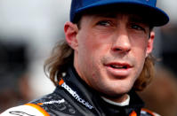 RICHMOND, VA - APRIL 27: Travis Pastrana, driver of the #99 Boost Mobile Toyota, stands on the grid during qualifying for the NASCAR Nationwide Series Virginia 529 College Savings 250 at Richmond International Raceway on April 27, 2012 in Richmond, Virginia. (Photo by Jeff Zelevansky/Getty Images for NASCAR)