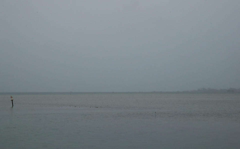 Kaneohe Bay is seen with low visibility after a U.S. Navy aircraft went down in Kaneohe Bay, Monday, Nov. 20, 2023, in Kaneohe, Hawaii. (Jamm Aquino/Honolulu Star-Advertiser via AP)