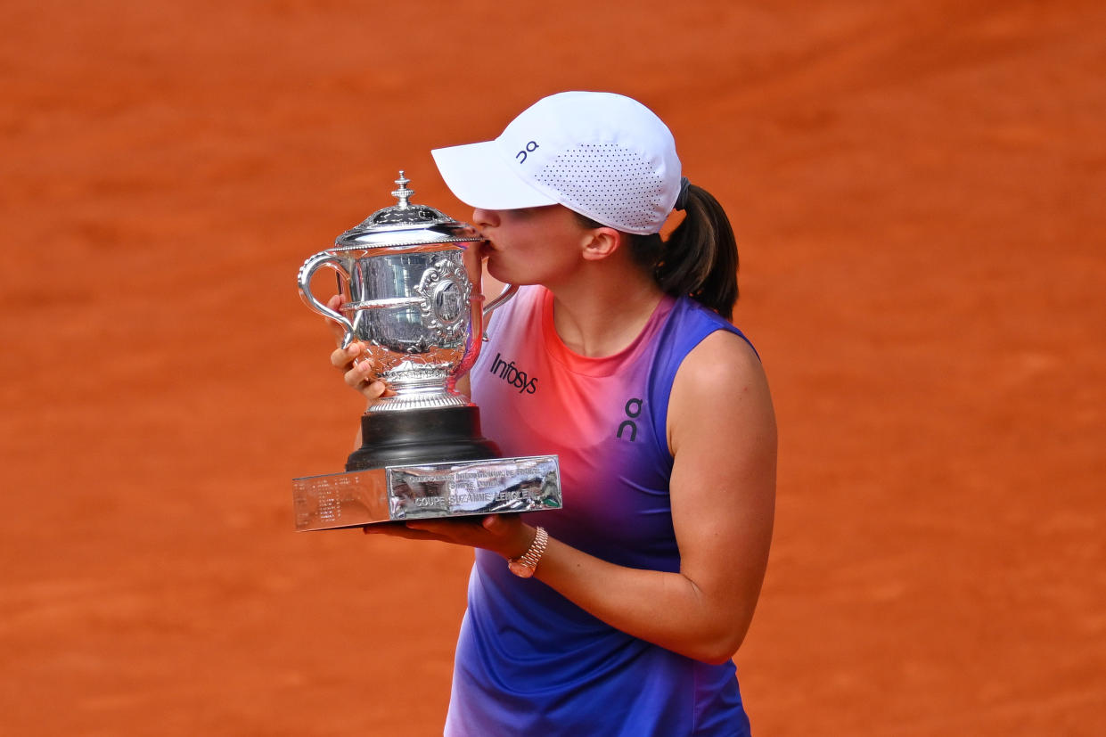 Iga Świątek is now one of four women to win the singles title at Roland Garros four times. (Photo by Tim Goode/Getty Images)