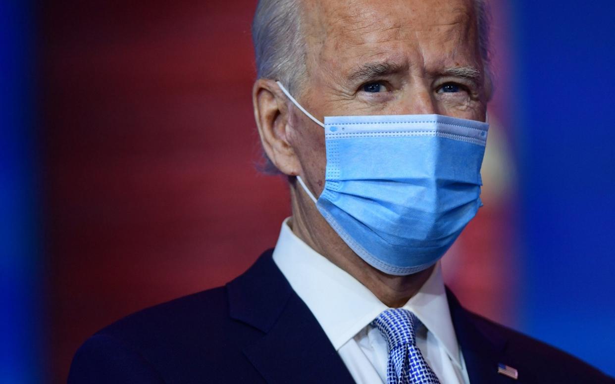 Biden said he would order masks to be worn in federal buildings and public transport - Mark Makela /Getty