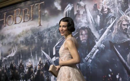 Cast member Evangeline Lilly poses at the premiere of "The Hobbit: The Battle of the Five Armies" at Dolby theatre in Hollywood, California December 9, 2014. The movie opens in the U.S. on December 17. REUTERS/Mario Anzuoni
