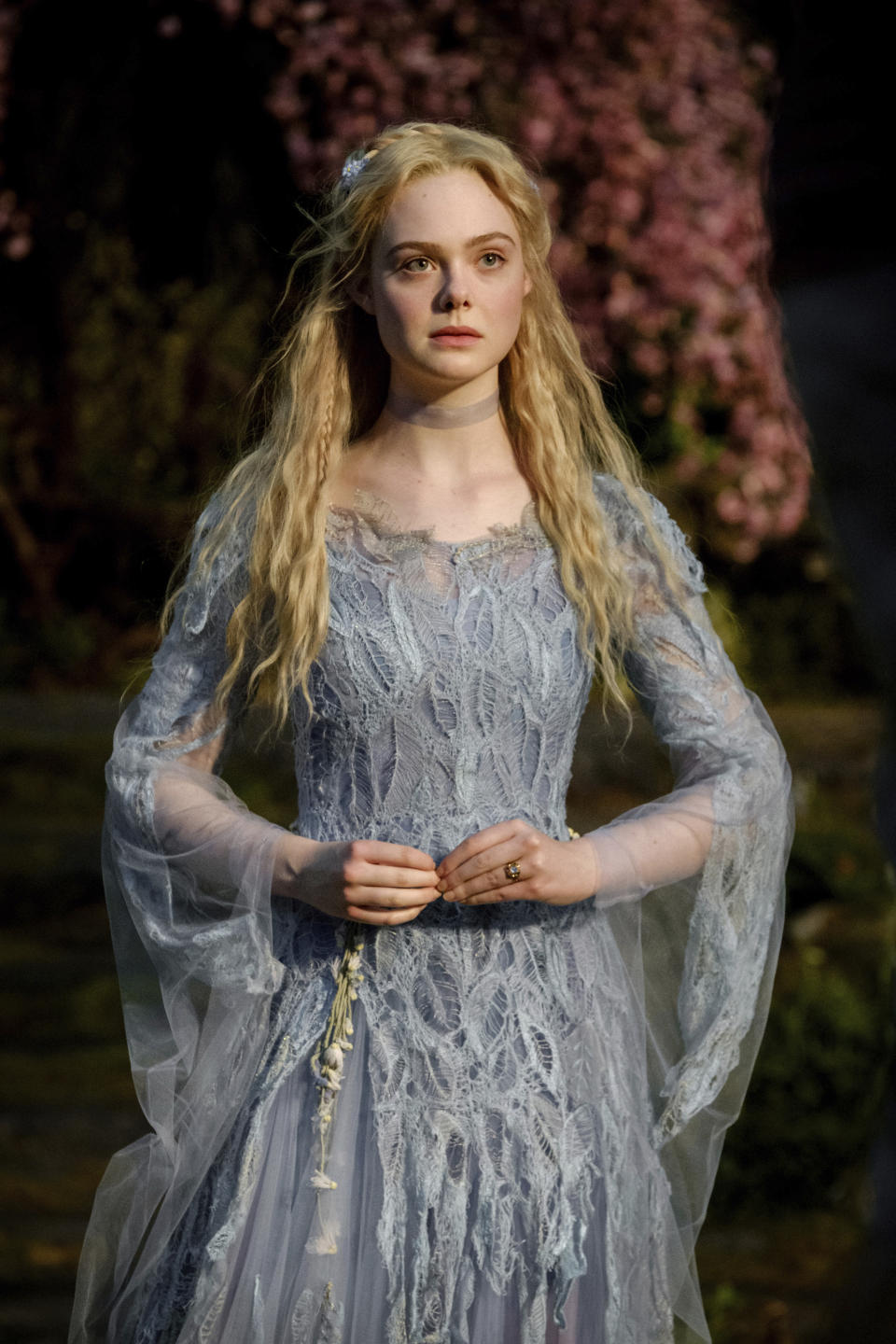 This image released by Disney shows Elle Fanning as Aurora in a scene from "Maleficent: Mistress of Evil." (Jaap Buitendijk/Disney via AP)