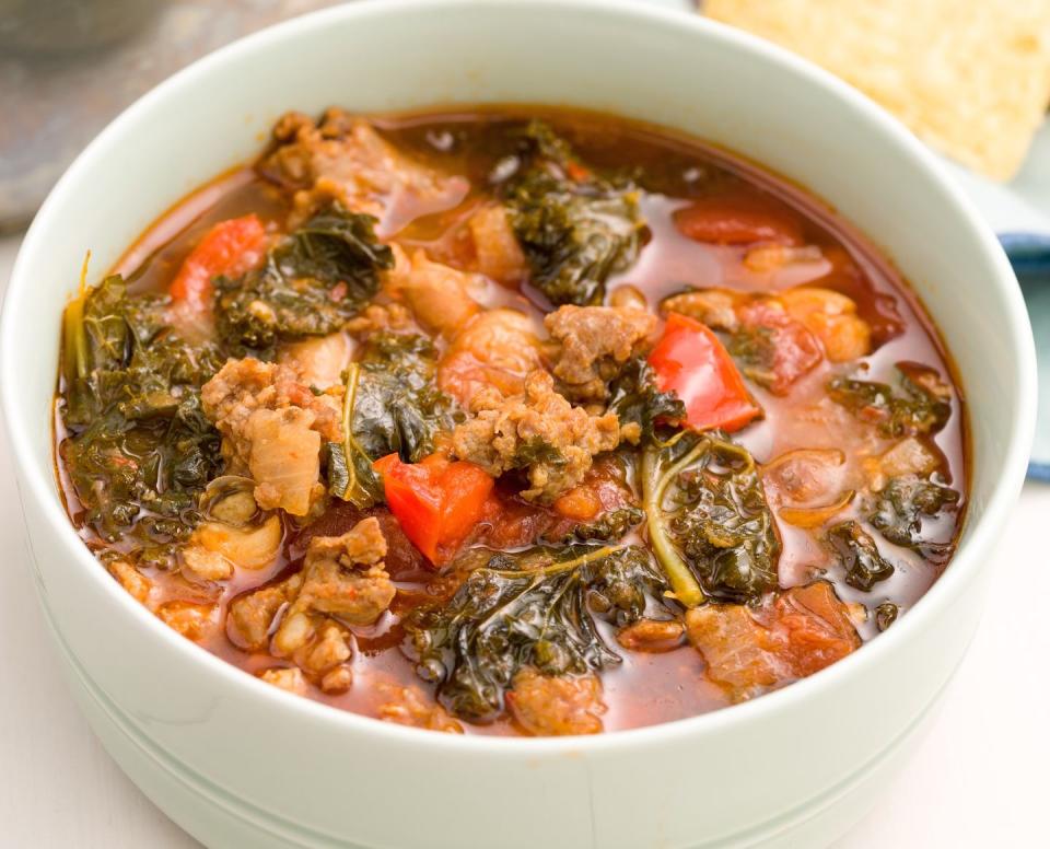 <p>This Italian-inspired chilli is packed with spicy turkey sausage and leafy kale for a tomato-y chilli.</p><p>Get the <a href="https://www.delish.com/uk/cooking/recipes/a33212637/spicy-turkey-sausage-kale-chili-recipe/" rel="nofollow noopener" target="_blank" data-ylk="slk:Spicy Turkey Sausage and Kale Chilli;elm:context_link;itc:0;sec:content-canvas" class="link ">Spicy Turkey Sausage and Kale Chilli</a> recipe.</p>
