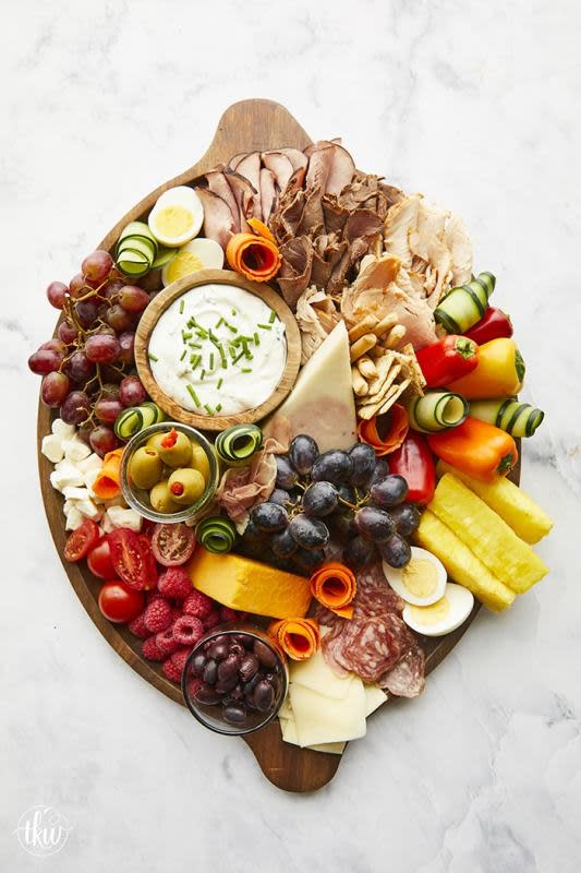 <p>The Kitchen Whisperer</p><p>Be a hosting guru with this delicious, easy, crowd-pleasing charcuterie board featuring meats, cheese, fruits, veggies and so much more!</p><p><strong>Get the recipe: <a href="https://www.thekitchenwhisperer.net/2019/12/21/be-a-hosting-guru-with-this-ultimate-charcuterie-board/" rel="nofollow noopener" target="_blank" data-ylk="slk:Ultimate Charcuterie Board;elm:context_link;itc:0;sec:content-canvas" class="link ">Ultimate Charcuterie Board</a></strong></p><p><strong>Related: 20 <a href="https://parade.com/948776/juliajordan/healthy-thanksgiving-side-dishes-and-recipes/" rel="nofollow noopener" target="_blank" data-ylk="slk:Lightened-Up Thanksgiving Sides;elm:context_link;itc:0;sec:content-canvas" class="link ">Lightened-Up Thanksgiving Sides</a></strong></p>