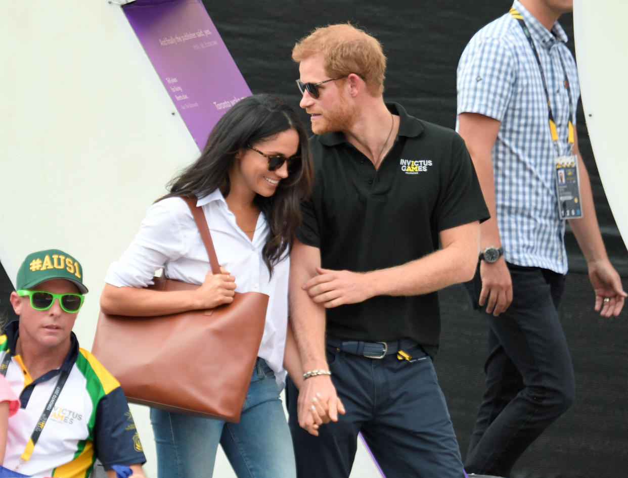 TORONTO, ON - SEPTEMBER 25:  Meghan Markle and Prince Harry attend the Wheelchair Tennis on day 3 of the Invictus Games Toronto 2017 at Nathan Philips Square on September 25, 2017 in Toronto, Canada.  The Games use the power of sport to inspire recovery, support rehabilitation and generate a wider understanding and respect for the Armed Forces.  (Photo by Karwai Tang/WireImage)