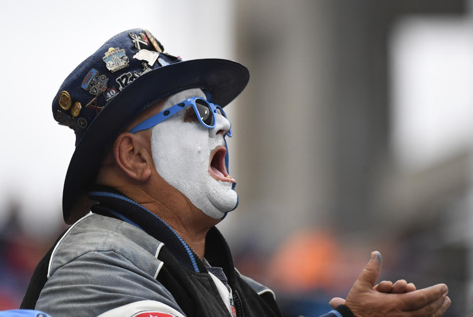 Nov 14, 2021; Nashville, Tennessee, USA; A Tennessee Titans fan cheers during the first half against the New Orleans Saints at Nissan Stadium. Mandatory Credit: Christopher Hanewinckel-USA TODAY Sports