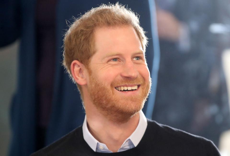 Britain's Prince Harry, Duke of Sussex smiles as he watches a trampolining session during his visit to a Fit and Fed half-term initiative in Streatham, south London on February 19, 2019. - Launched in 2016, Fit and Fed is a campaign led by StreetGames that aims to tackle the holiday gap of hunger, inactivity, and isolation. The project offers activity sessions and a nutritious meal every day for local children. (Photo by Chris Jackson / POOL / AFP)        (Photo credit should read CHRIS JACKSON/AFP via Getty Images)