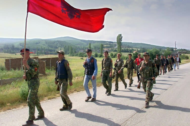 Kosovo Liberation Army fighters marching down the mountains towards Kosovan city Lapusnik in 1999