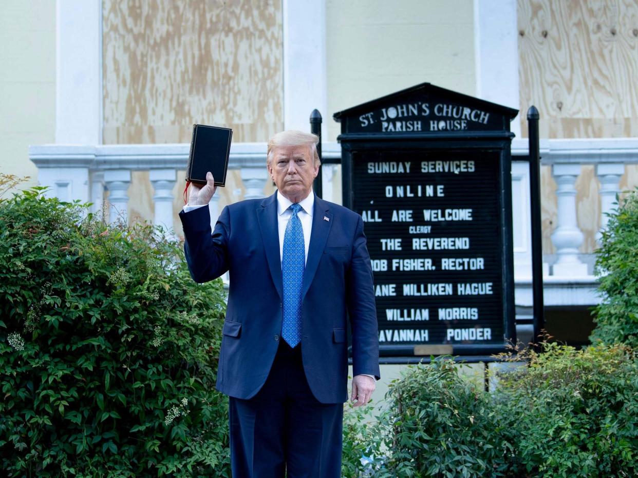 US president Donald Trump outside St. John's Church across from the White House: AFP via Getty Images