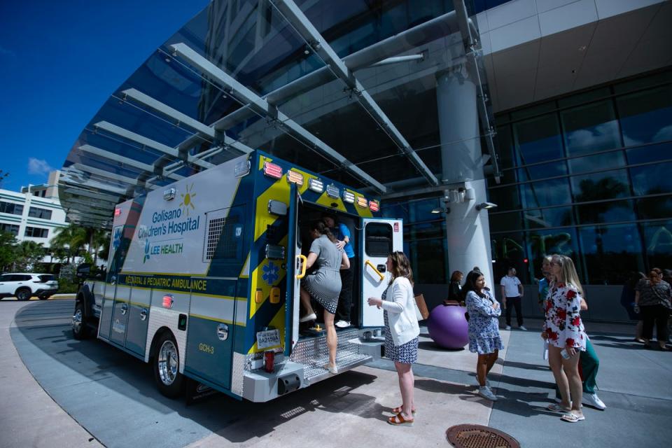 Visitors tour the new sensory-friendly ambulance to be used by Golisano Children's Hospital. During a media conference on Friday, April 26, 2024, representatives of Lee Health's Golisano Children's Hospital of Southwest Florida announced the hospital has been designated as Florida's first Certified Autism Center and is now outfitted with the area's first sensory-friendly ambulance.