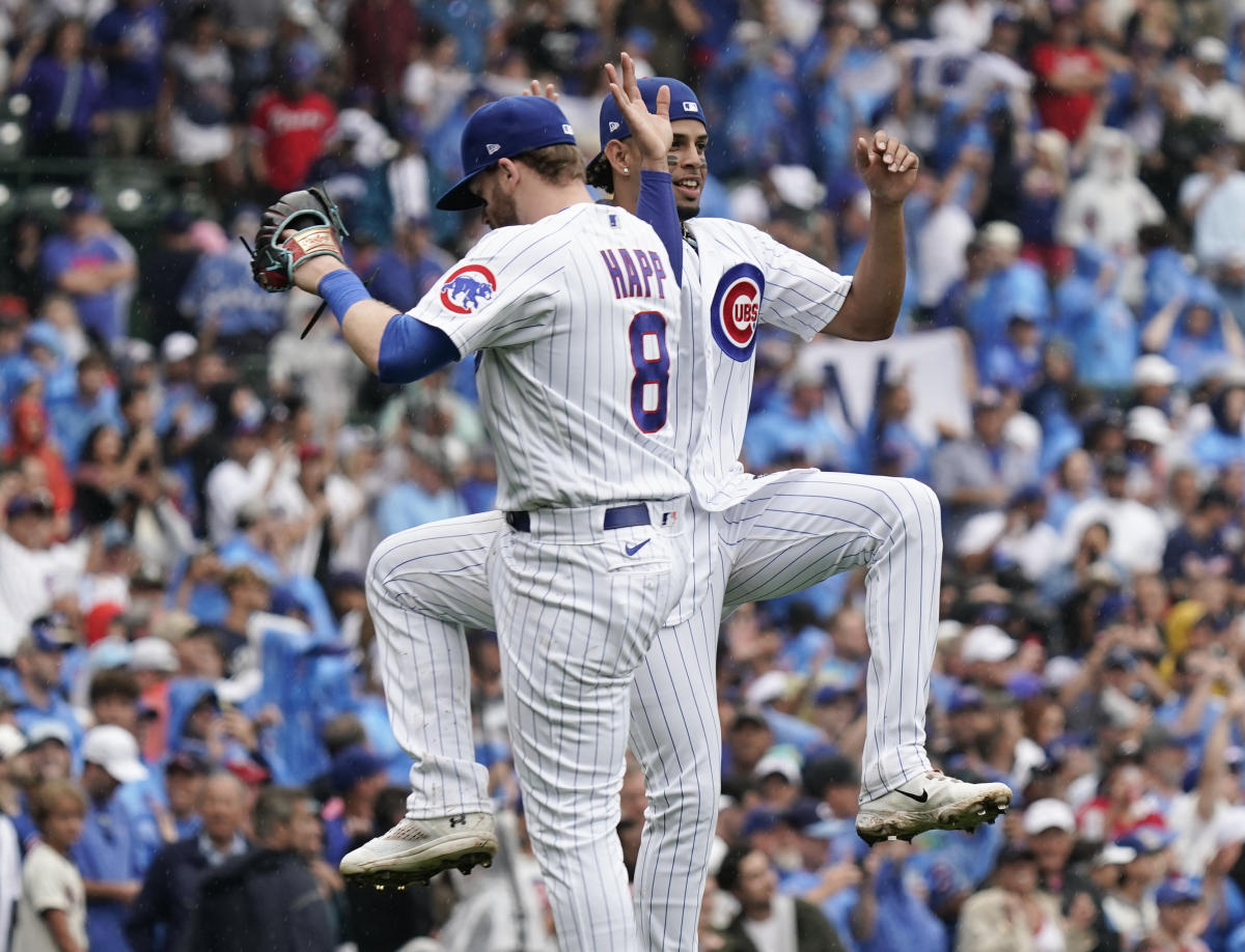 Swanson and Candelario go deep as the Cubs hold off the Braves 8-6 at rainy  Wrigley - ABC News