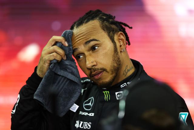 Lewis Hamilton looks on as his Denver Broncos go down against the