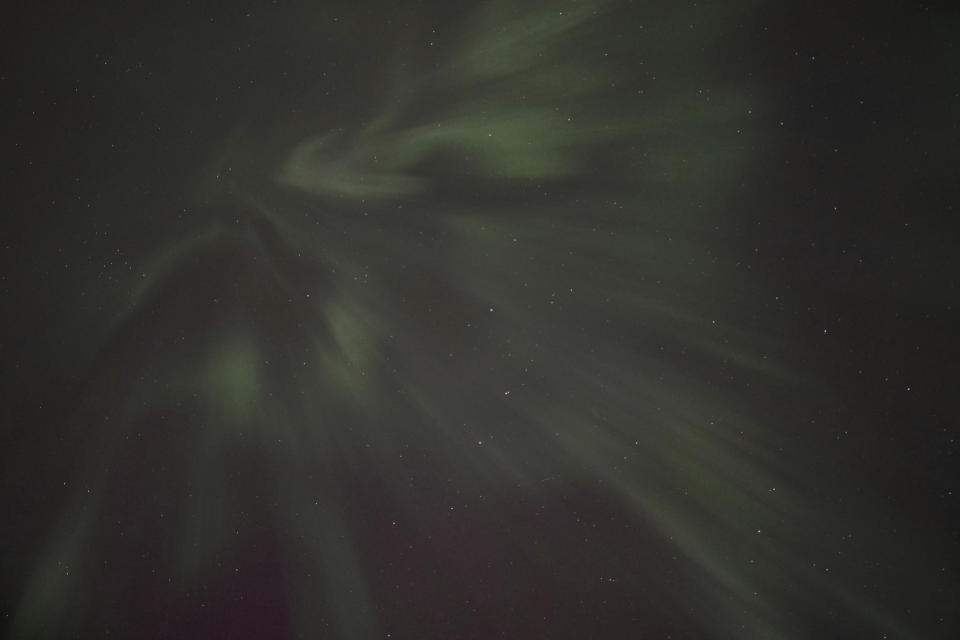 The northern lights glow in the sky over St. Croix State Forest near Markville, Minn., late Friday, May 10, 2024. (AP Photo/Mark Vancleave)