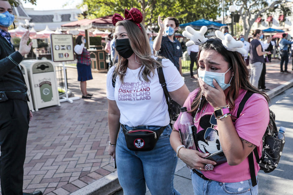 Disneyland guests are overcome with emotions at the April 30 re-opening of the California theme park. (Photo Robert Gauthier / Los Angeles Times via Getty Images)