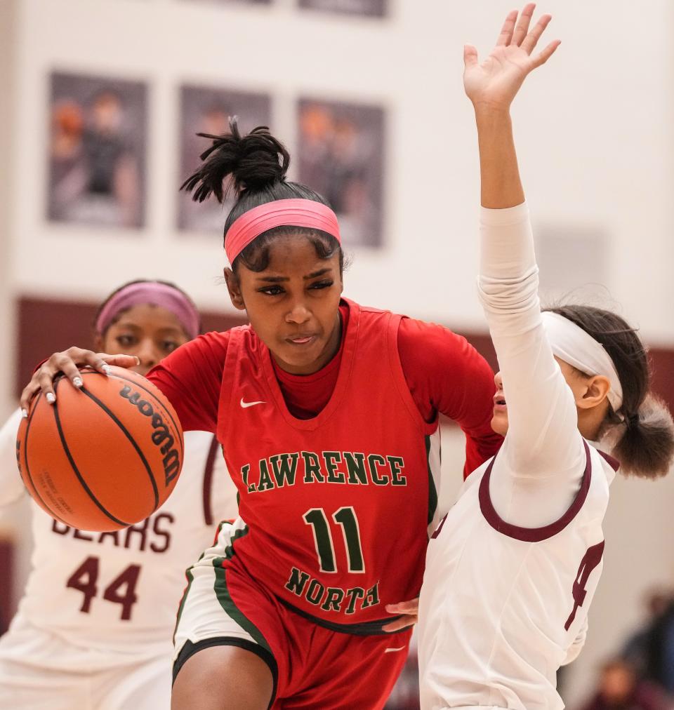 Lawrence North Wildcats guard Kamara Mills (11) rushes up the court Thursday, Dec. 7, 2023, during the game at Lawrence Central High School in Indianapolis. The Lawrence Central Bears defeated the Lawrence North Wildcats, 57-55.