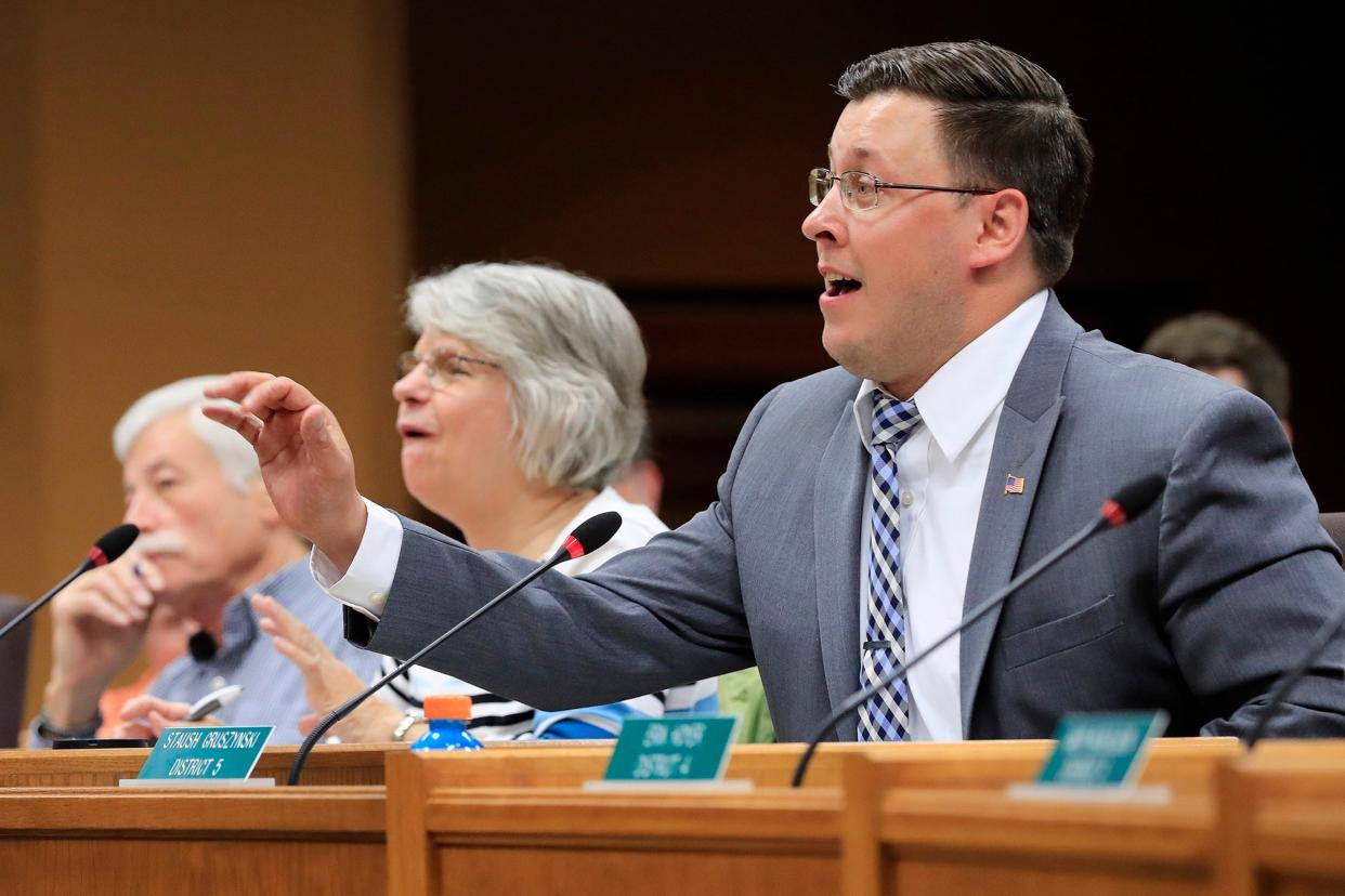 Former state Staush Gruszynski, shown in a 2017 photo speaking at a Brown County Board of Supervisors meeting in Green Bay. As a state lawmaker, Gruszynski was stripped of his committee assignments and the Democratic cucus after an investigation into sexual harassment of a staff member.