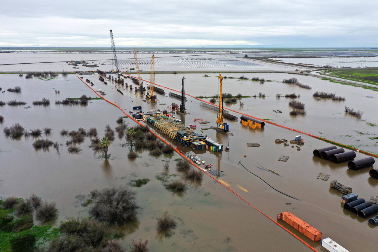 Construction equipment for California High Speed Rail project surrounded by flooding in Tulare County near Allensworth, Calif. (Patrick T. Fallon / AFP via Getty Images file )