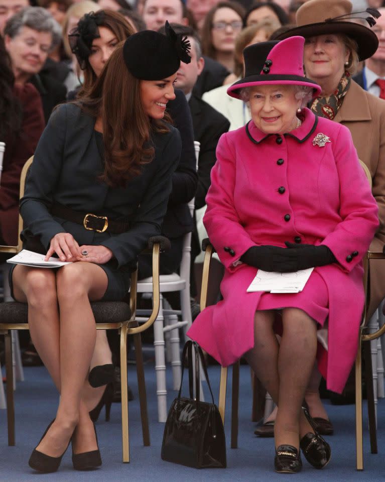 <p>The Duchess of Cambridge accompanies The Queen to watch a fashion show at De Montfort University in Leicester during a visit to the city as part of the Diamond Jubilee Tour. (Oli Scarff/PA Wire) </p>