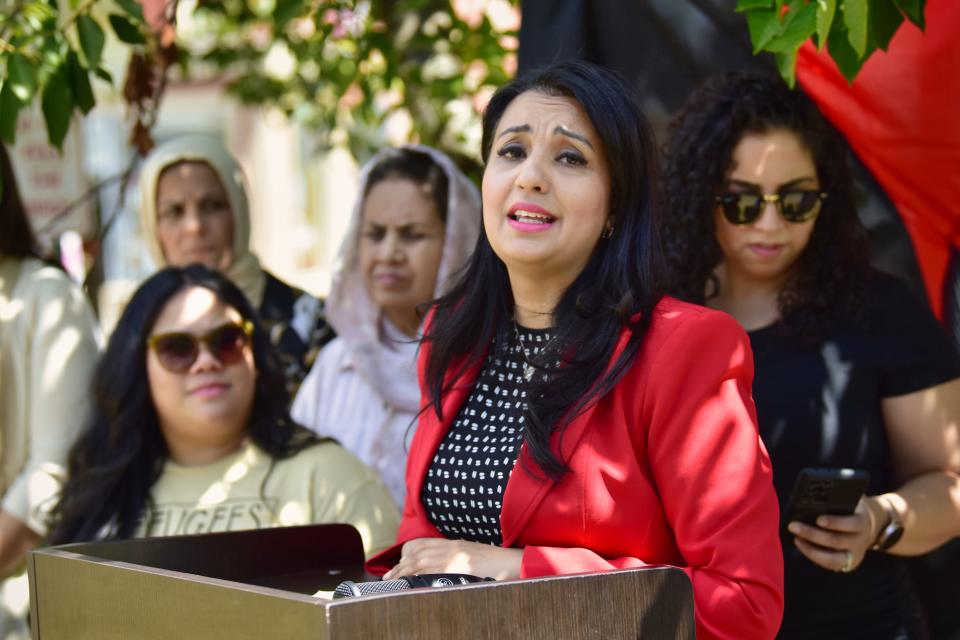 Freshta Taeb, co-leaders of NJ Coalition for Afghan Refugees and a board member of Afghan American  Foundation, speaks during the press conference for marking one-year since the fall of Kabul, hosted by NJ Coalition for Afghan Refugees in Paterson, Sunday on 08/14/22.