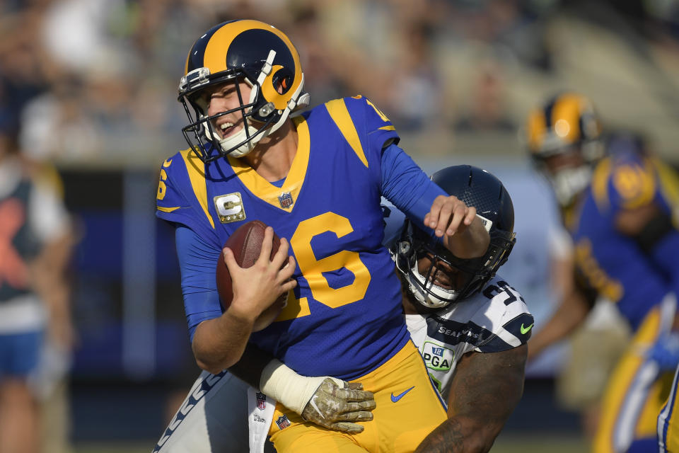 Los Angeles Rams quarterback Jared Goff gets sacked by Seattle Seahawks defensive end Quinton Jefferson during the first half in an NFL football game Sunday, Nov. 11, 2018, in Los Angeles. (AP Photo/Mark J. Terrill)