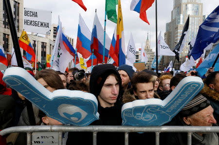 People attend a rally to protest against tightening state control over internet in Moscow, Russia March 10, 2019. REUTERS/Shamil Zhumatov