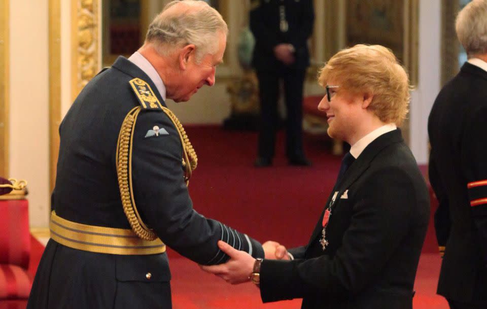 Ed Sheeran's royal faux pas when he met Prince Charles was touching his arm as he was handed over the MBE. Source: Getty