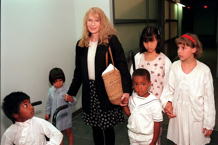 Mia Farrow with some of her kids in 1996. From left: Thaddeus, Frankie-Minh, Farrow, Isaiah, Tam, and Dylan. (Photo: AP Photo)